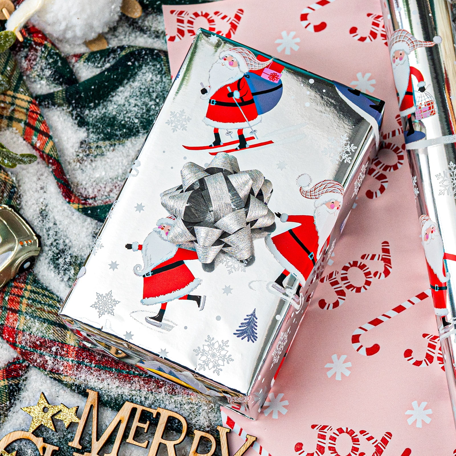 HOMERAL Christmas Wrapping Paper Roll, Festive Holiday Gift Wrap with Santa Claus and Candy Cane Patterns (White, 17 in x 33 ft) dvn11