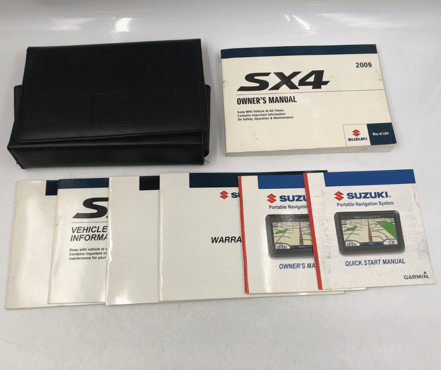 Suzuki 2009 SX4 Owners Manual Handbook Set with Protective Case (OEM) 8t3vc