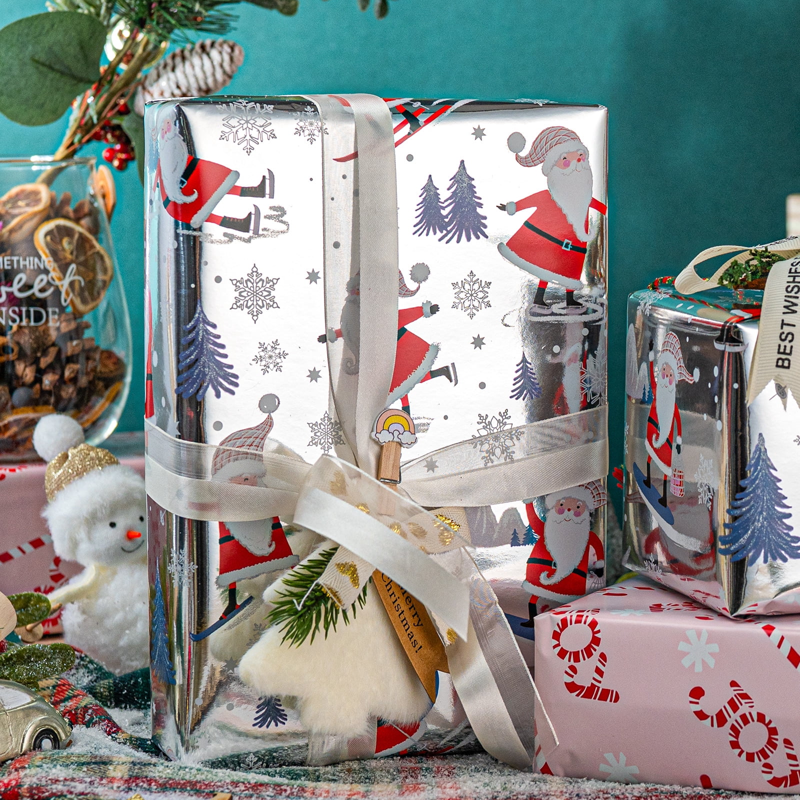 HOMERAL Christmas Wrapping Paper Roll, Festive Holiday Gift Wrap with Santa Claus and Candy Cane Patterns (White, 17 in x 33 ft) dvn11