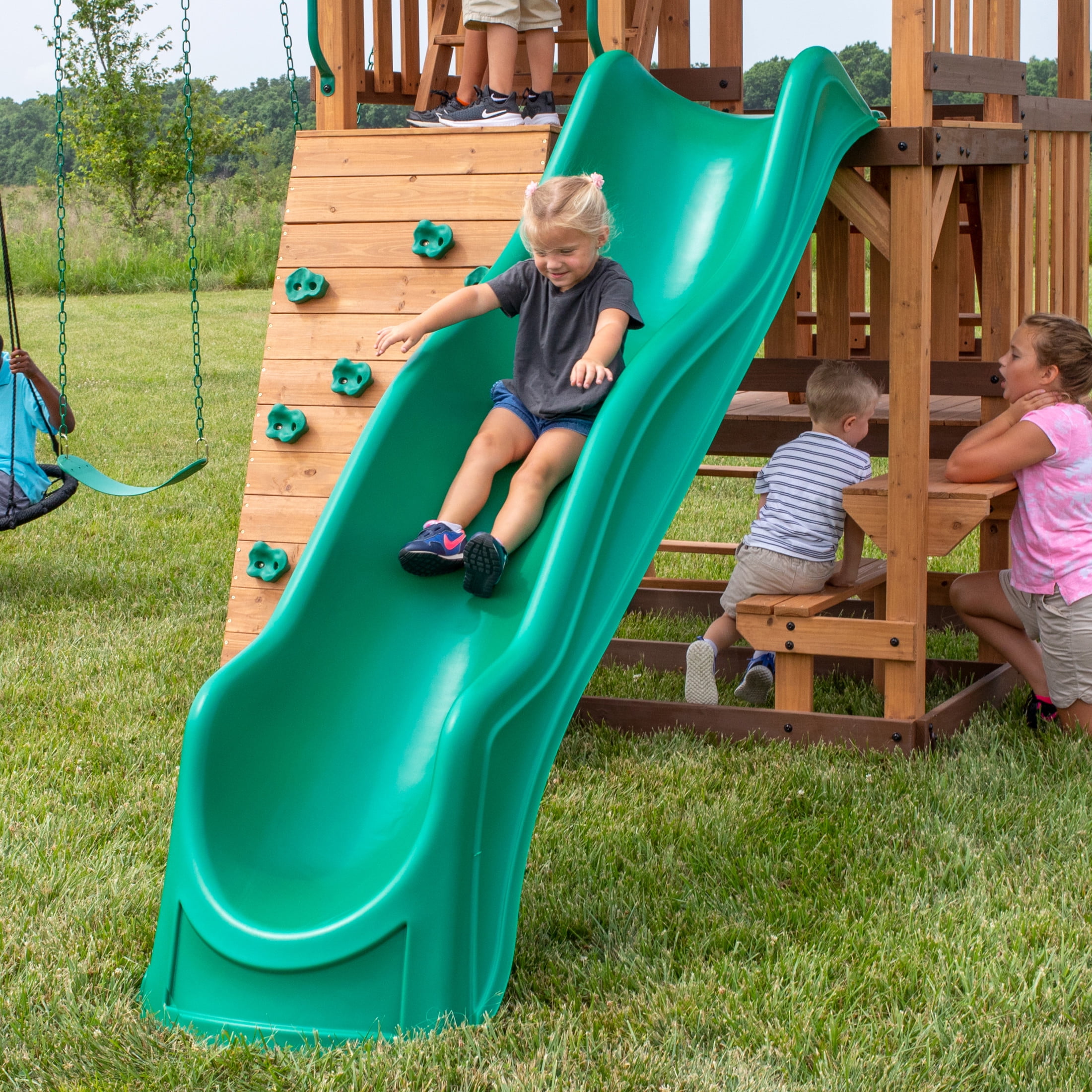 Backyard Discovery Highlander Cedar Wood Swing Set with Wave Slide and Three-Story Clubhouse (Brown, 10 ft Slide) 3xbnq