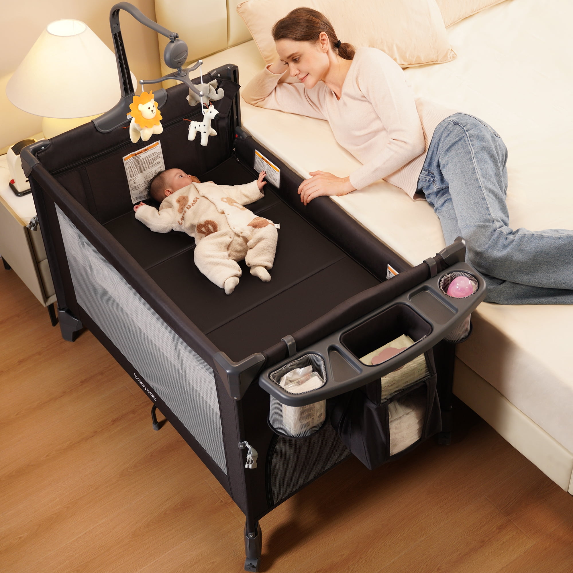 Babyeap 4-in-1 Portable Baby Bassinet and Playard with Changing Table (Black, 30 lb Capacity) npfzr
