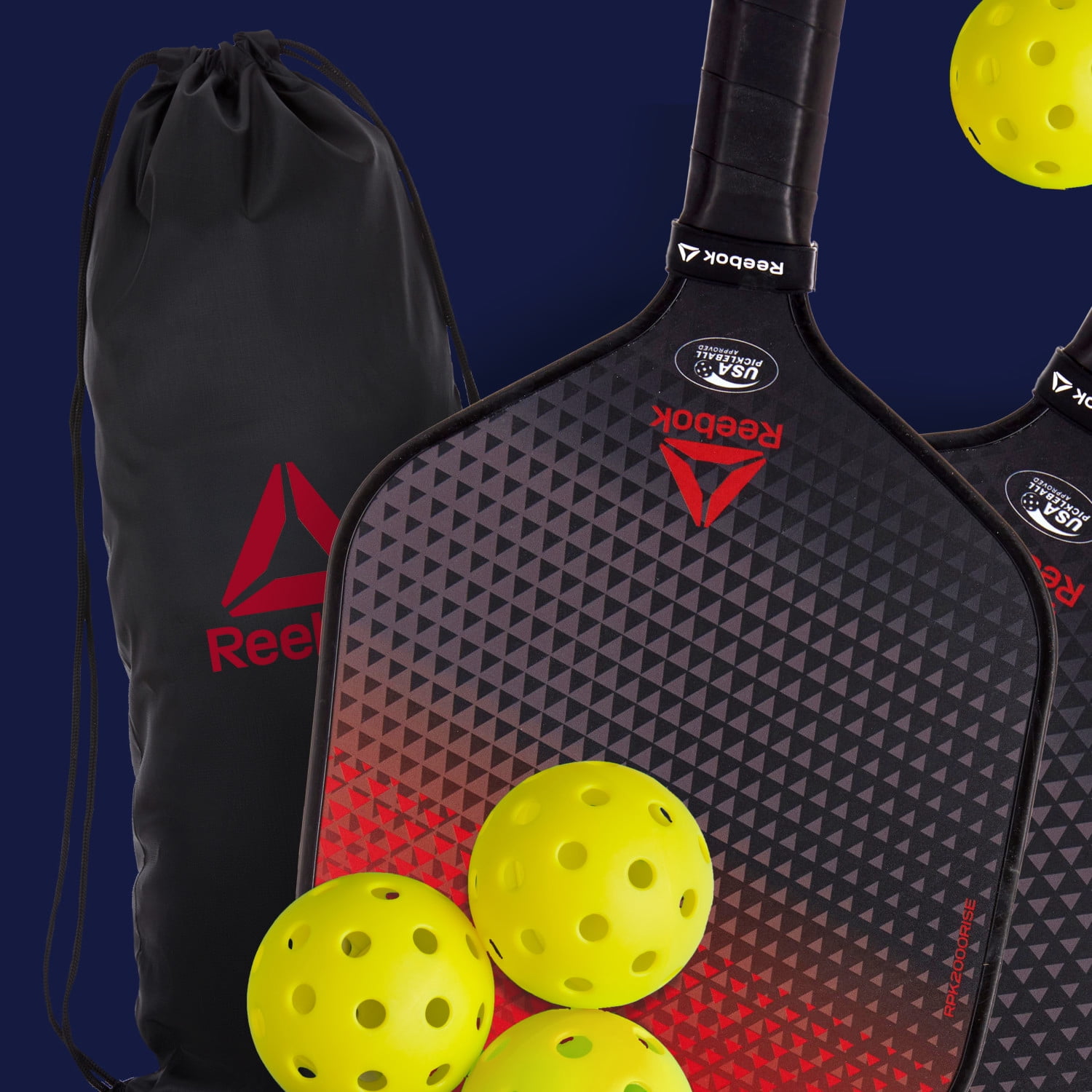 Reebok 7-Piece Pickleball Paddle Set with Fiberglass Surface and Cushioned Grip (2 Paddles, 4 Balls, 1 Bag) g3x2a