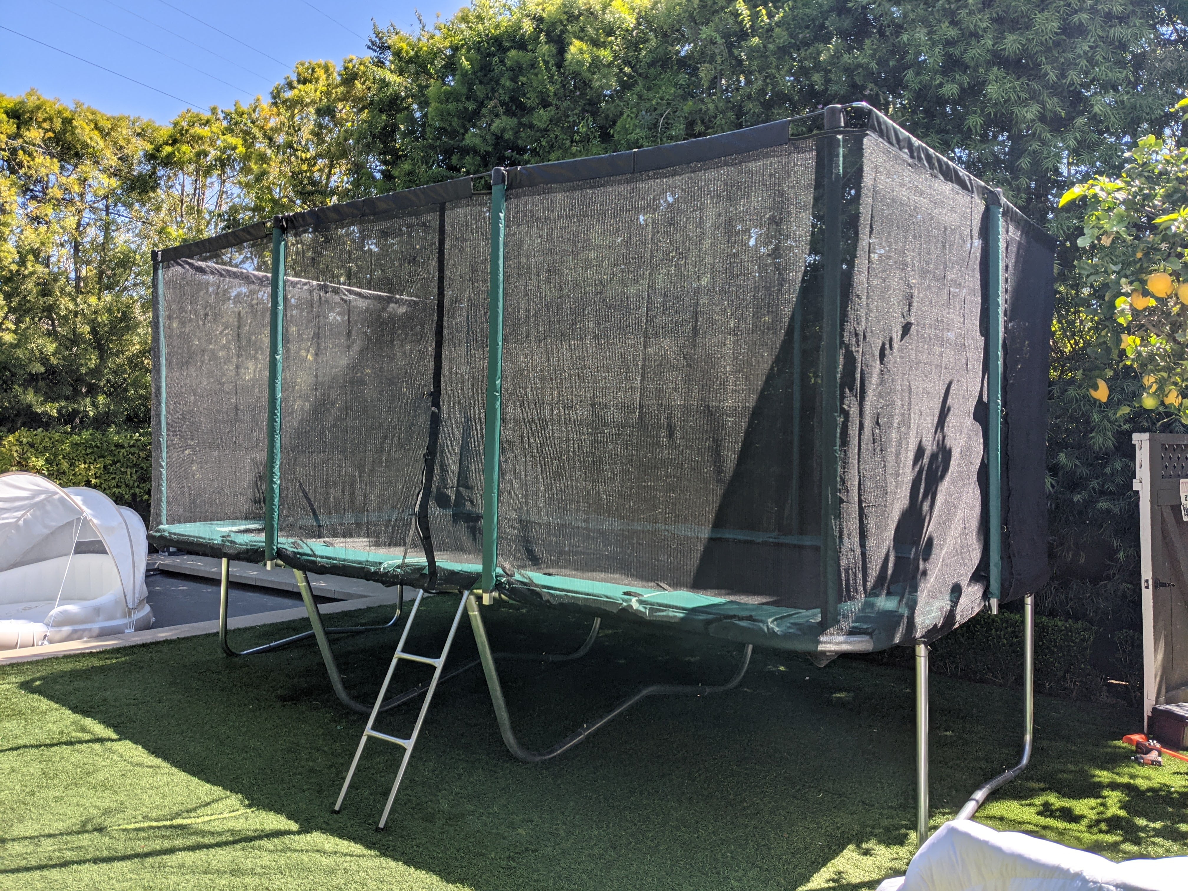 Galactic Xtreme Outdoor Rectangle Trampoline with Safety Net Enclosure (Black, 10x17 ft) dvk21