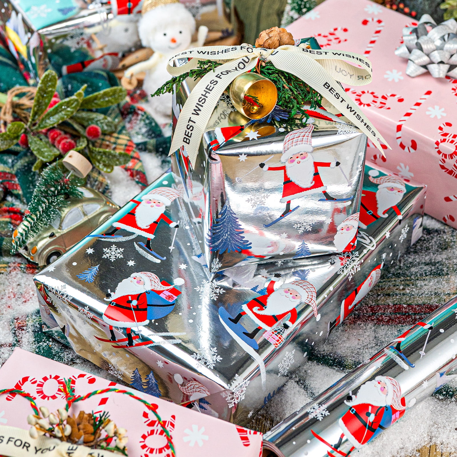 HOMERAL Christmas Wrapping Paper Roll, Festive Holiday Gift Wrap with Santa Claus and Candy Cane Patterns (White, 17 in x 33 ft) dvn11