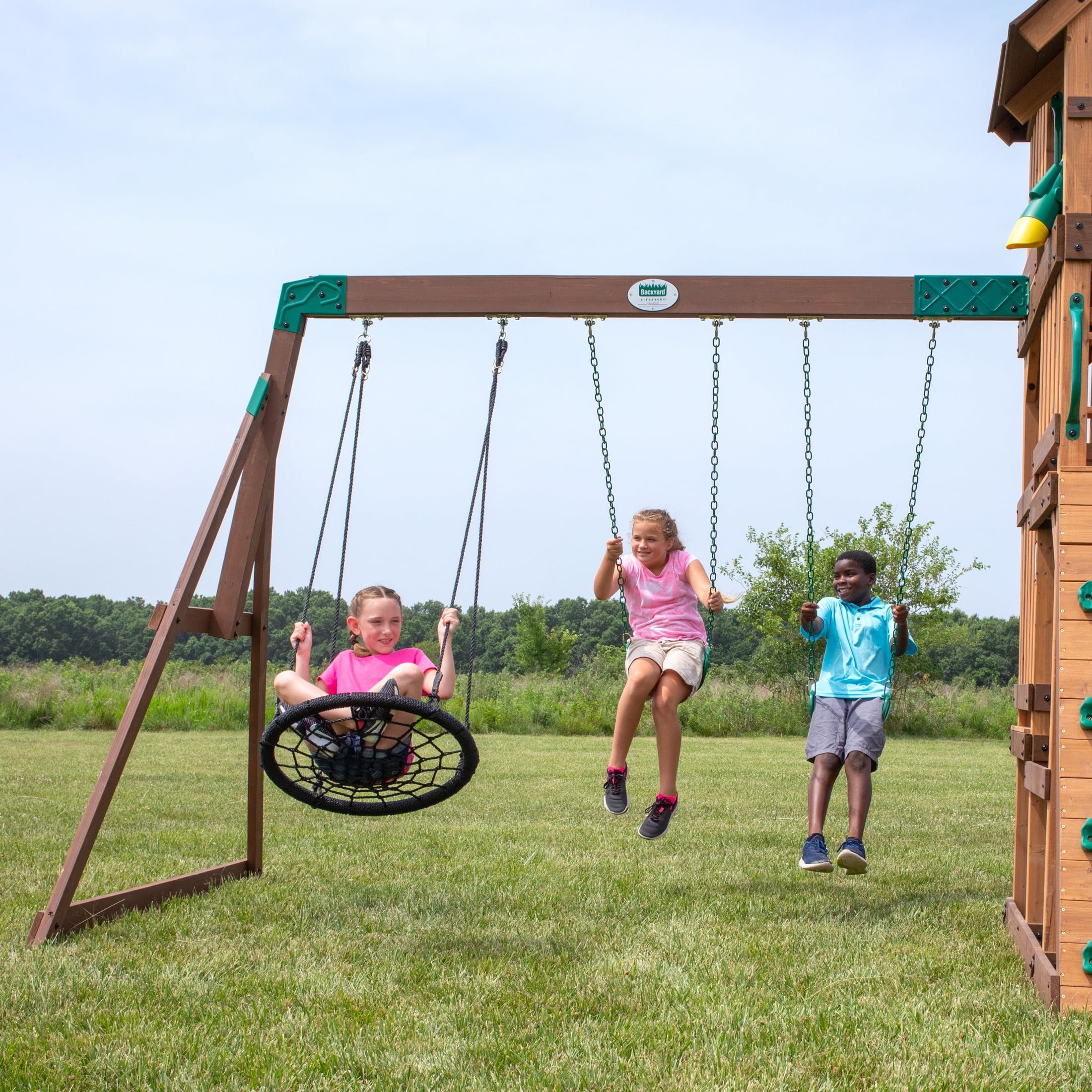 Backyard Discovery Highlander Cedar Wood Swing Set with Wave Slide and Three-Story Clubhouse (Brown, 10 ft Slide) 3xbnq