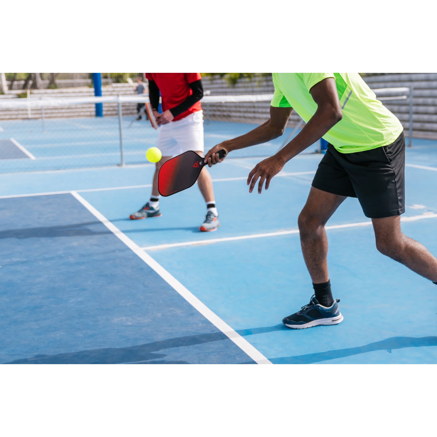 Reebok 7-Piece Pickleball Paddle Set with Fiberglass Surface and Cushioned Grip (2 Paddles, 4 Balls, 1 Bag) g3x2a