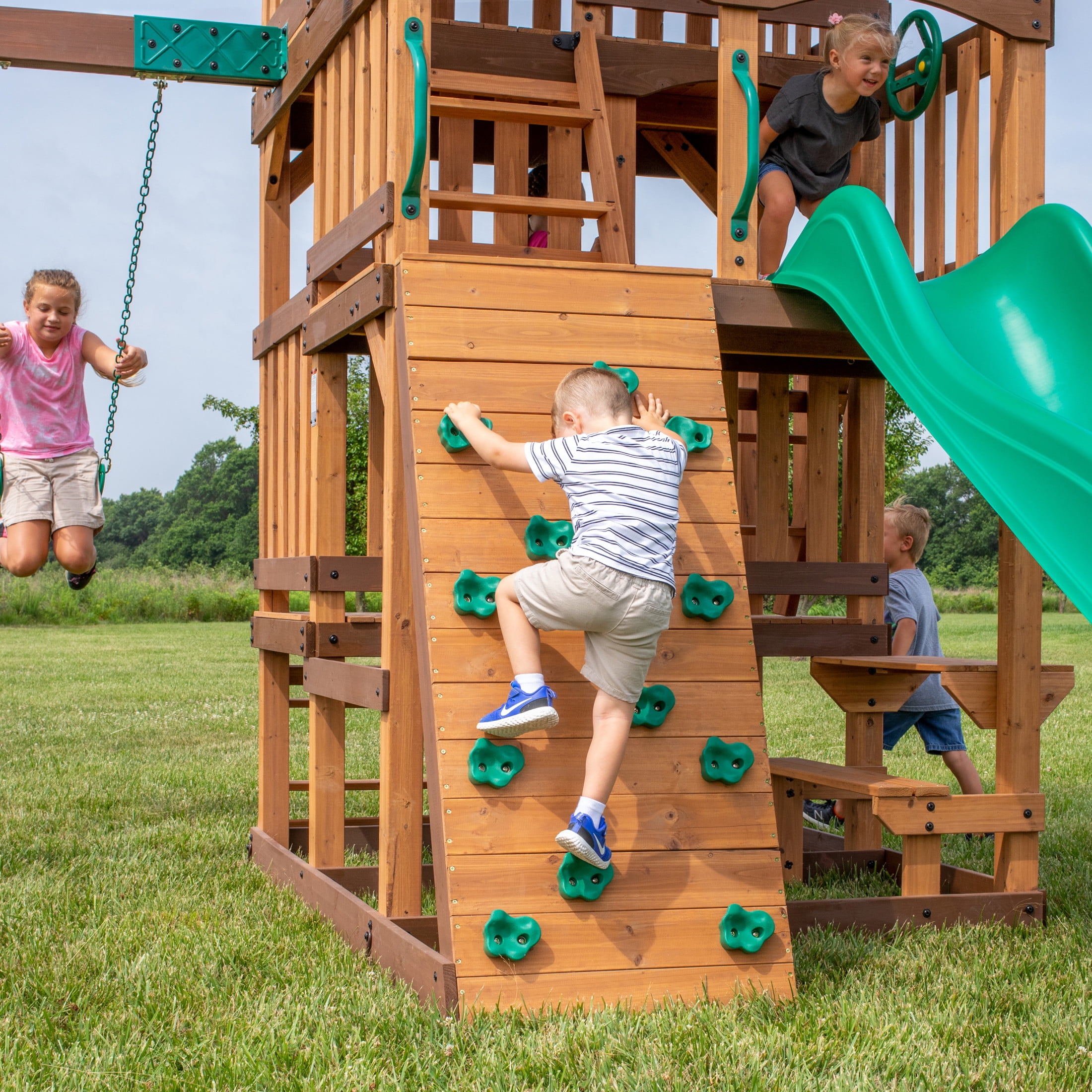 Backyard Discovery Highlander Cedar Wood Swing Set with Wave Slide and Three-Story Clubhouse (Brown, 10 ft Slide) 3xbnq
