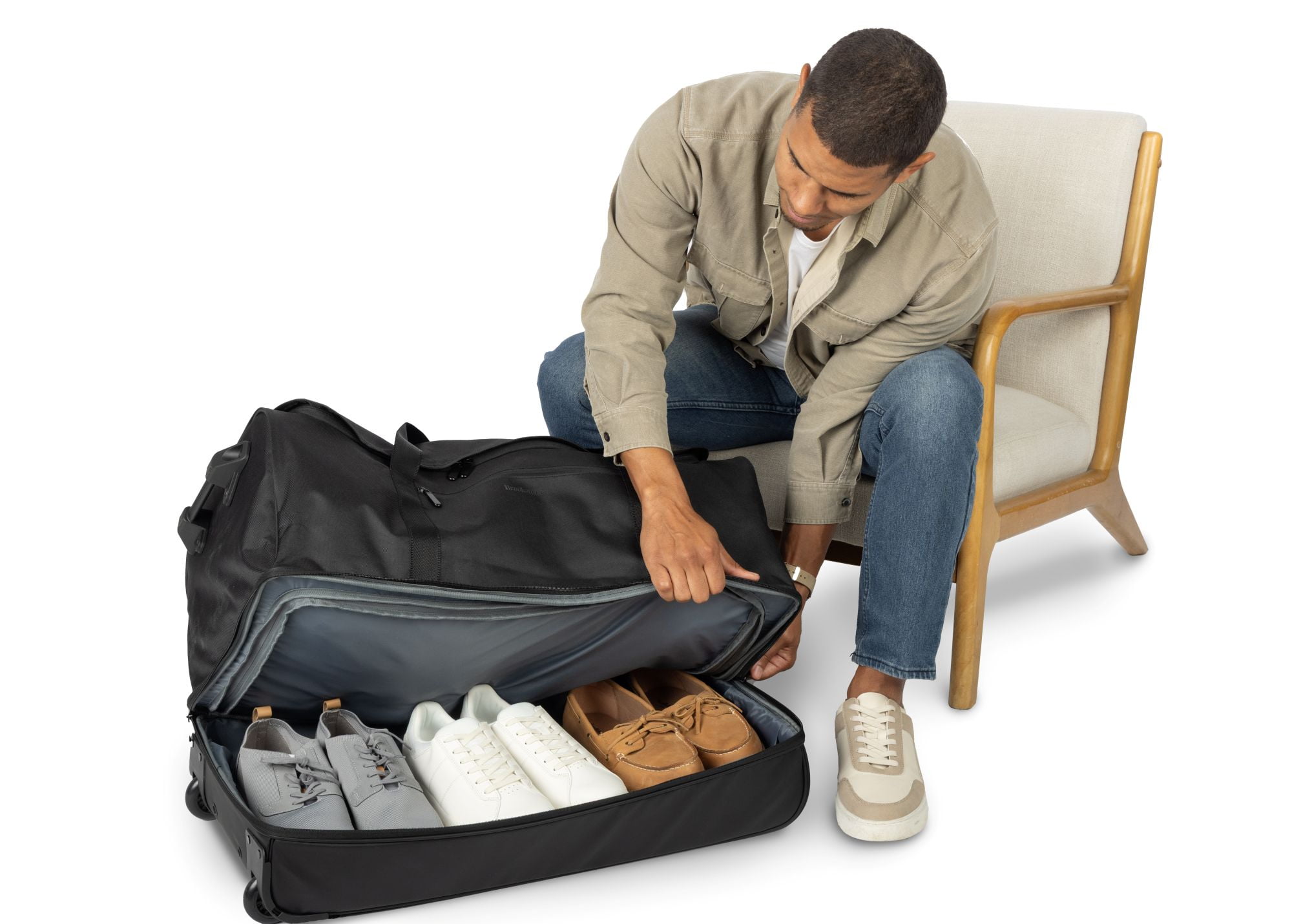 Brookstone 28 in Wheeled Duffel Bag, Durable Travel Luggage with Rolling Wheels (Black, 28 in) 587np