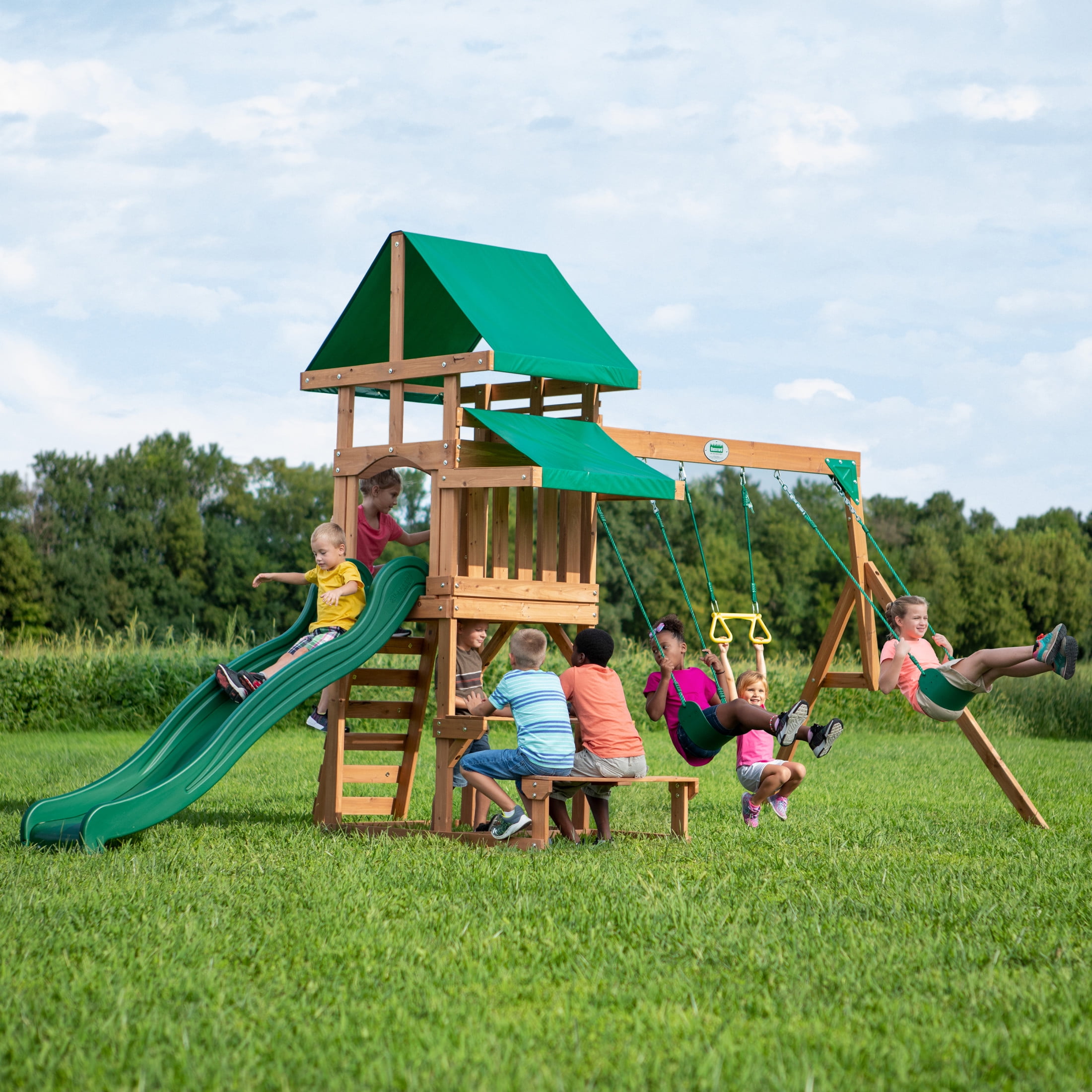 Backyard Discovery Belmont Cedar Wood Swing Set with Slide, Play Deck, and Rock Wall Ladder (White Canopy, 1 Unit) dtlr1