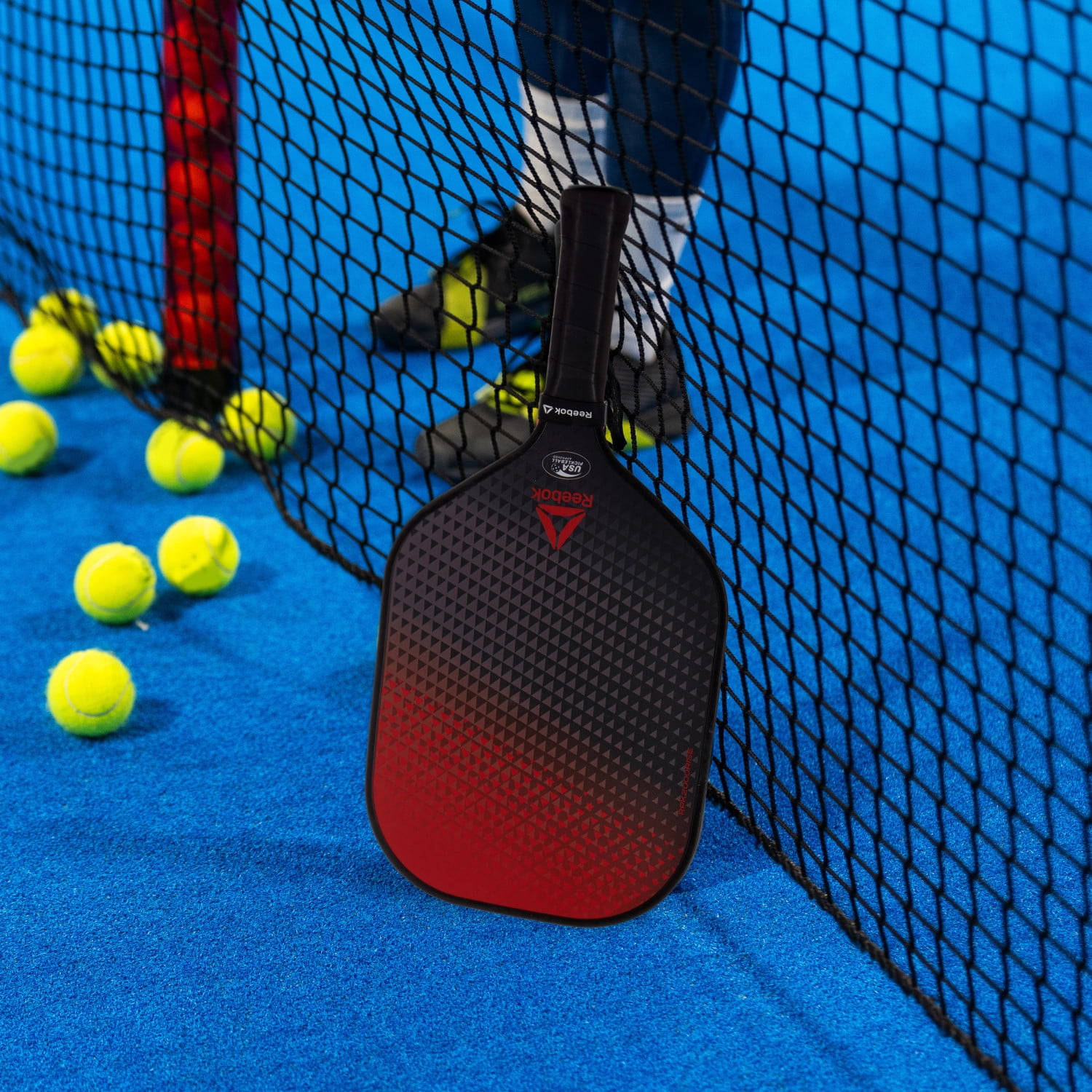 Reebok 7-Piece Pickleball Paddle Set with Fiberglass Surface and Cushioned Grip (2 Paddles, 4 Balls, 1 Bag) g3x2a