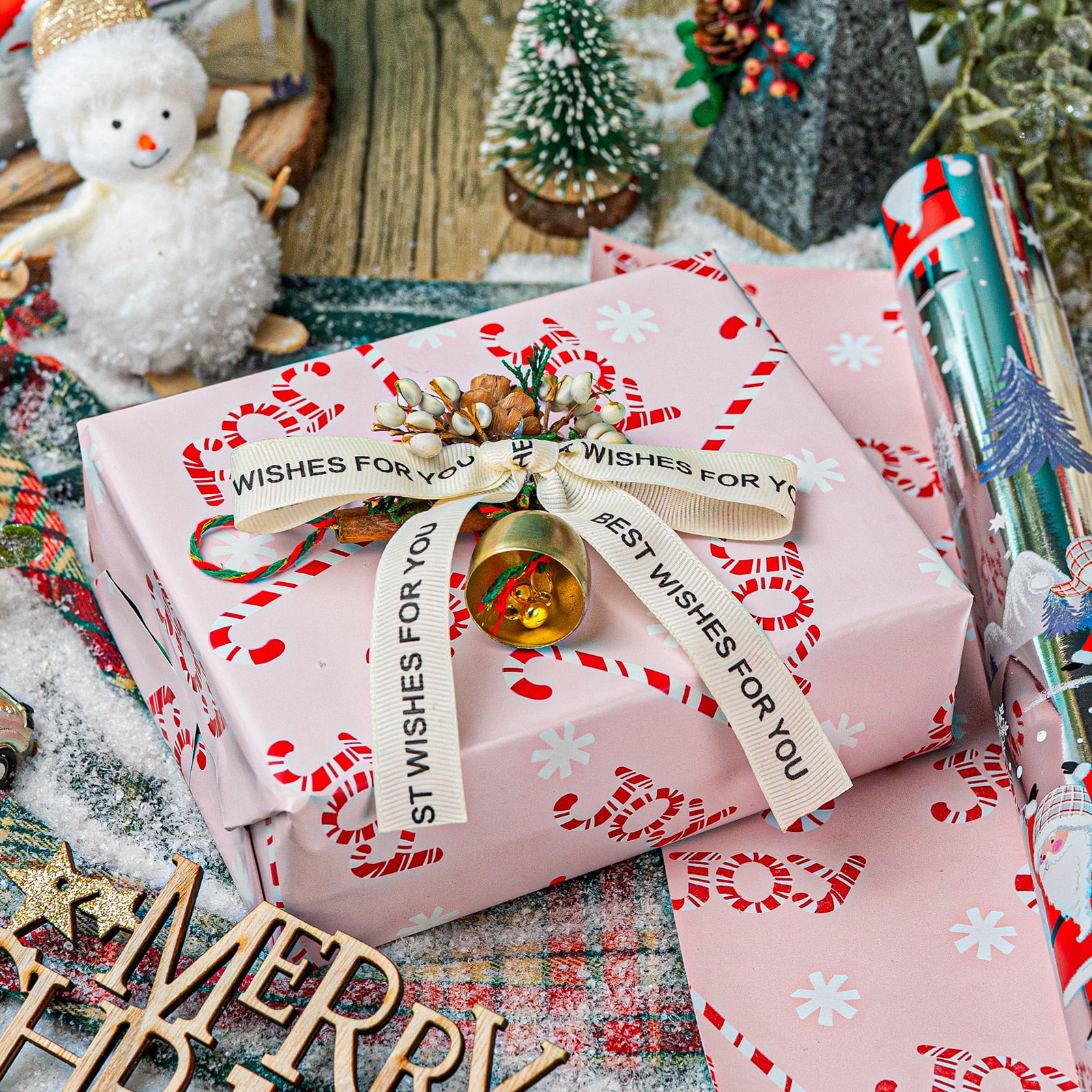 HOMERAL Christmas Wrapping Paper Roll, Festive Holiday Gift Wrap with Santa Claus and Candy Cane Patterns (White, 17 in x 33 ft) dvn11